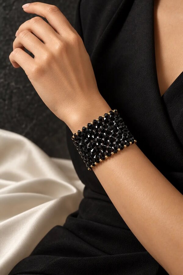 Pulsera ancha Vivit con cristales negros y oro